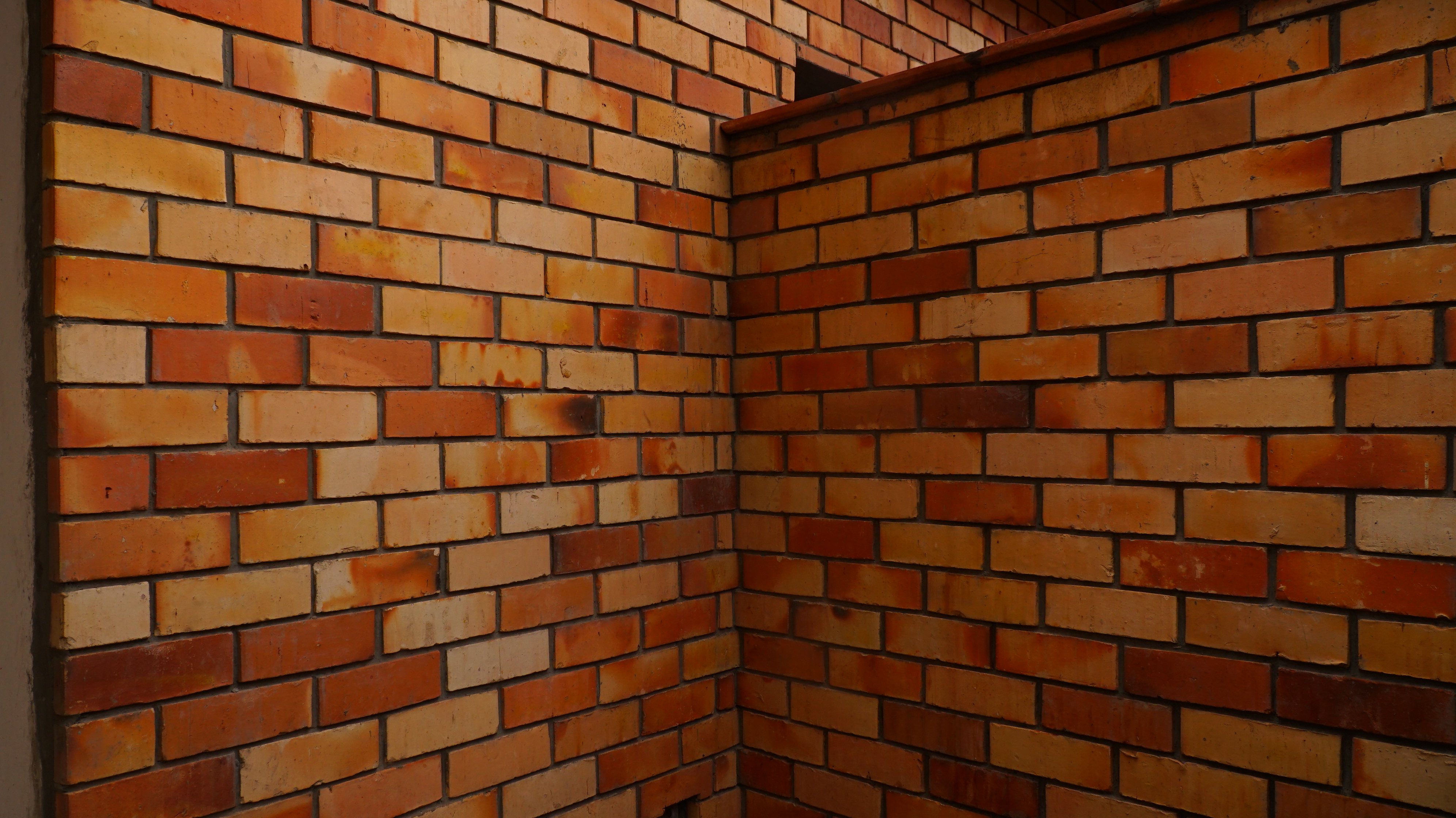 Clay floor tiles laid in a covered outdoor space